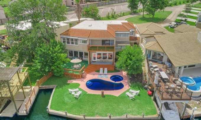 April Sound Casa | Lake front retreat with pool, spa, golf, fishing, boat slip, 4 bed, 4 bath sleeps 21