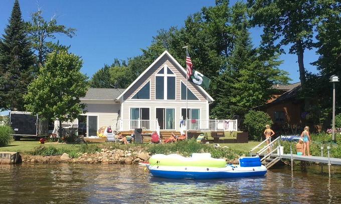 Cadillac Casa | Lake Mitchell Cottage- Sleeps 10-12 comfortably. Great location with Sandy Beach