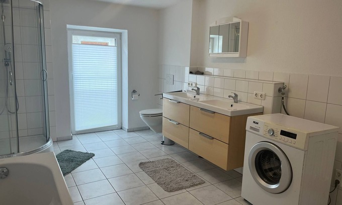 Ammerland Apartamento | Lake Starnberg: Maisonette with wood-burning stoves, balcony, bathrooms