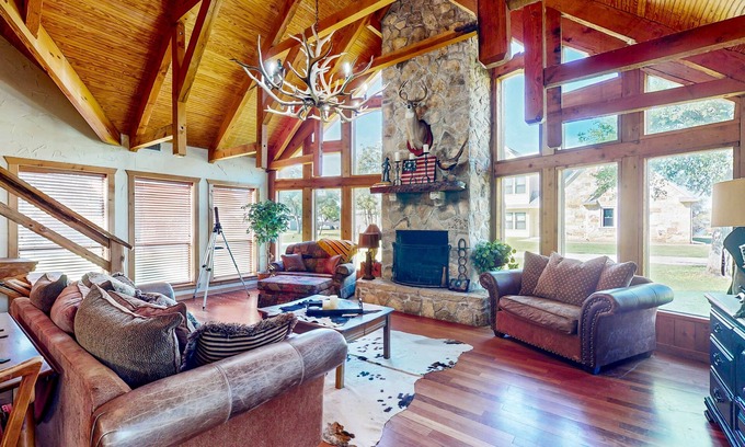 Lake Whitney Casa | Lake view home with expansive yard, lovely porch & nearby lake access