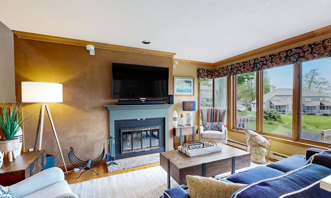 Gilford Casa | Lake-view townhome with lakefront swimming, pools, fireplace, tennis/pickleball
