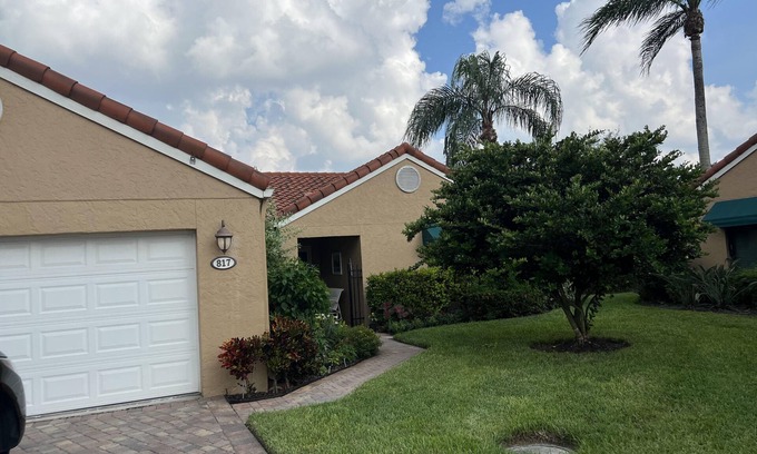 Pelican Bay Casa | Lakefront 3 bedroom, 2 bath home in gated community. Walking distance to beach.