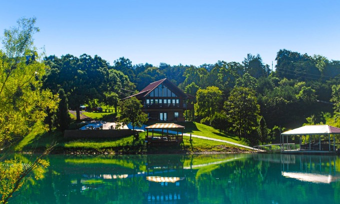 Sevierville Cabina | Lakefront cabin with views, boat ramp, dock, hot tub, & free attraction tickets