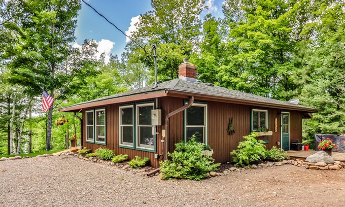 Presque Isle Casa | Lakefront cabin with dock, kayaks, SUP, wood fireplace, & washer/dryer