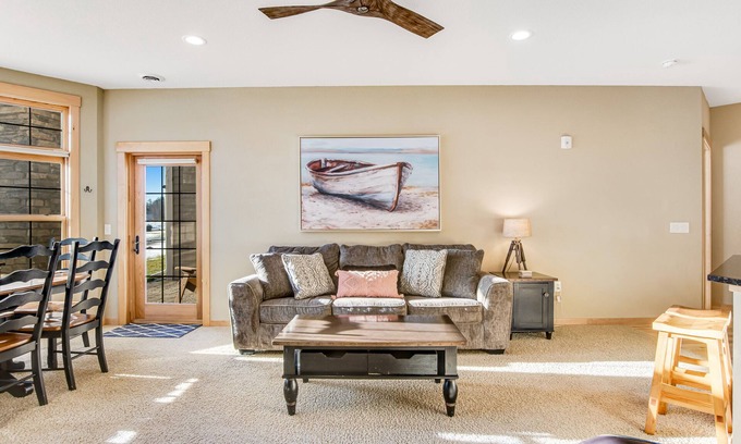 Three Lakes Condominio | Lakefront, ground floor condo with indoor pool - fireplace, patio & washer/dryer