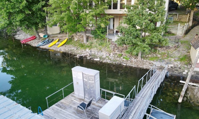Lost Bridge Village Casa | Lakefront home on the water, private cove & hot tub on Beaver Lake, Garfield, AR