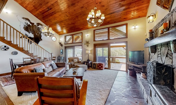Rock Harbor Cabina | Lakefront home with amazing views, grill, fire pit, private dock, & AC