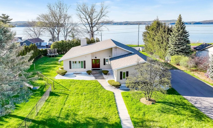 Colchester Casa | Lakefront home with pool, beach access, central AC, washer/dryer, & fireplace