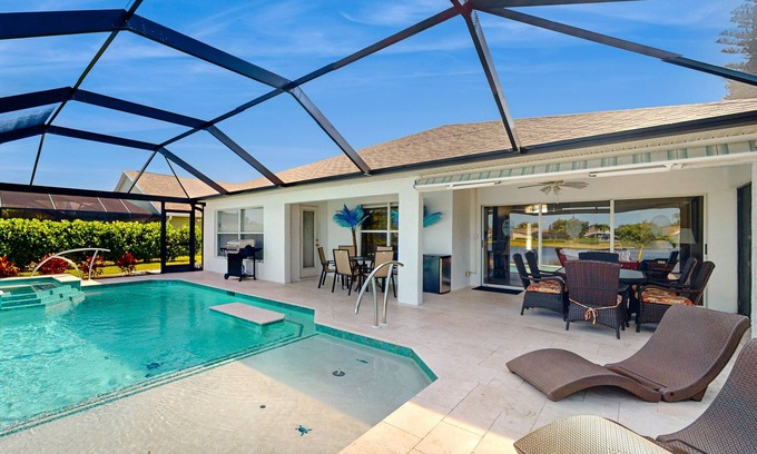 Beachwalk Isles Casa | Lakefront home with private heated outdoor pool, enclosed lanai, & central AC