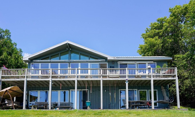 Schuyler Falls Casa | Lakefront home with fireplace, deck, patio, kayaks, and small beach