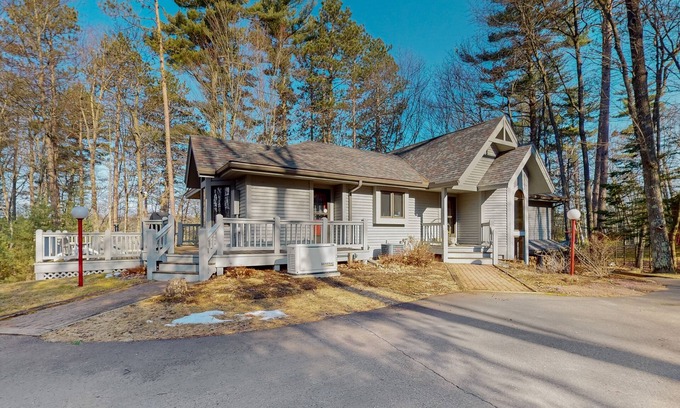 Hazelhurst Casa | Lakefront home with private outdoor sauna, dock, firepit, wood fireplace & patio
