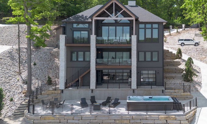 Sunrise Beach Casa | Lakefront Luxury 7 bed Home with Private Dock, Swim Spa on 13MM in Porto Cima
