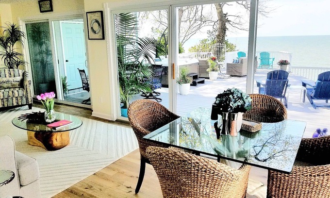 Mentor-on-the-Lake Casa | Lakefront Oasis Retreat Private Beach-Hot Tub-Pet Friendly-3 Bd/2 B-King Suite