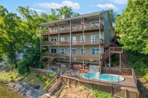 Lake of the Ozarks Casa | Lakefront Ozarks Home Tiki Bar, Pool, Deck, Views