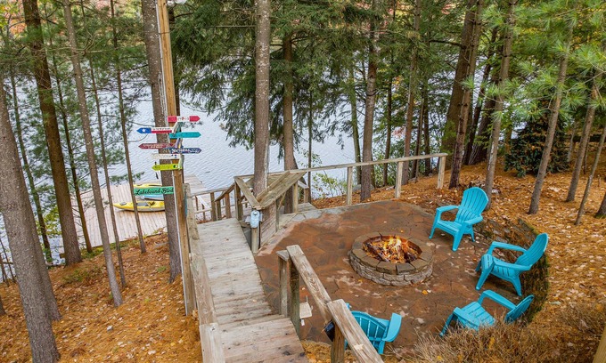 South Boardman Casa | Lakefront retreat 30 min to Traverse City. Hot tub, fire pit, kayaks, game room.