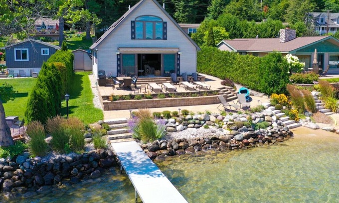 Rapid City Cabaña | Lakefront Retreat on Torch Lake Sandbar