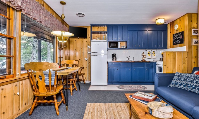 Presque Isle Casa | Lakefront suite at a vintage resort with communal dock, rowboats & firepit