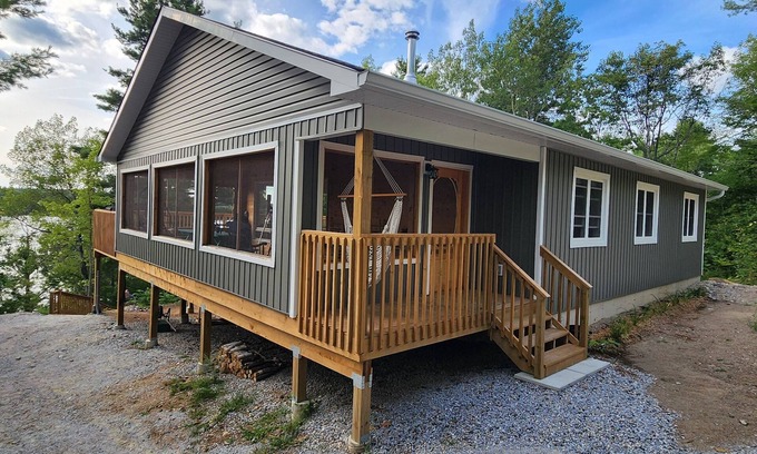 North Frontenac Cabaña | Lakefront, treetop, cottage. Immerse yourself in a panorama of nature.