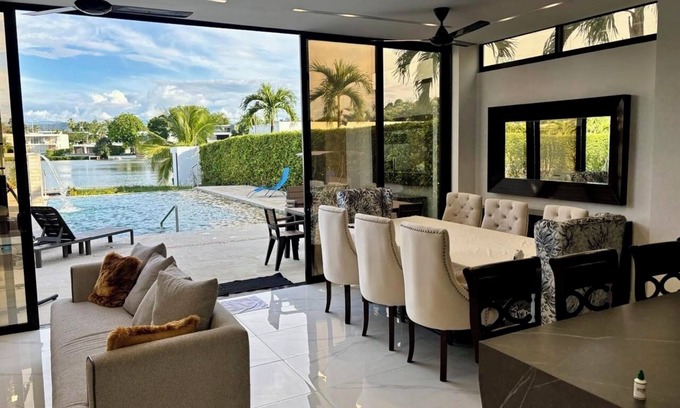 Girardot Cabaña | Lakefront villa with private Dook, Piscina & Jacuzzi