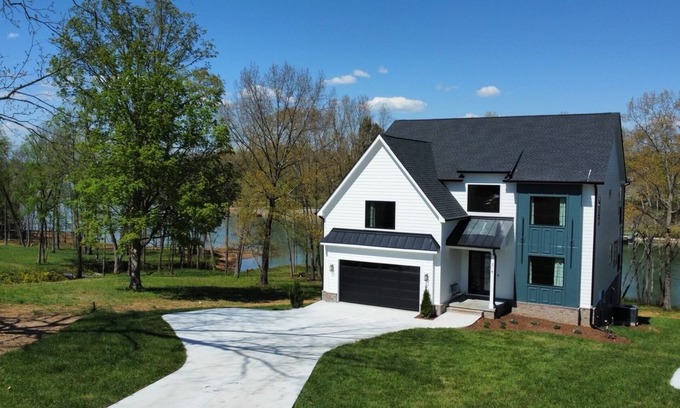 Winchester Casa | Lakeshore Modern! Lake front with platform dock and 2 kayaks, firepit and views