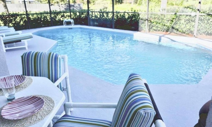 Lake Berkley Casa | Lakeside house, huge south facing pool with spa, lake view, & Disney at 8 miles