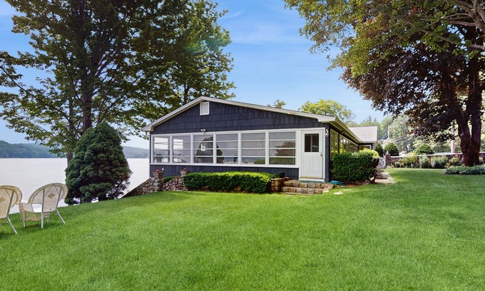 Alton Bay Casa | Lakeside paradise w/ lakefront deck, enclosed porch, 2 docks & large lawn