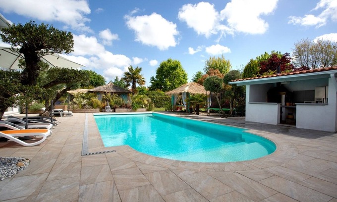 Biscarrosse Casa | Casa grande (10 personas) en gran parque cerrado con árboles, piscina climatizada