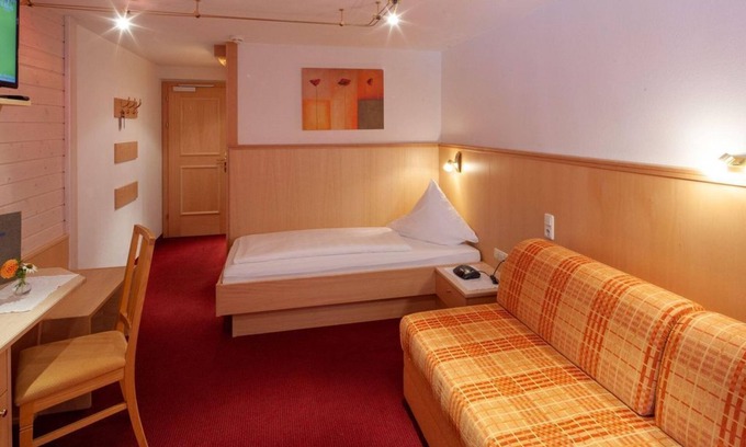 Damuels Casa | Large family room - Hotel Restaurant Alpenblume