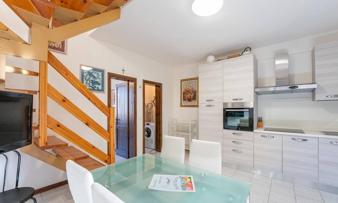 Lido degli Estensi Apartamento | LARGE FOUR-ROOM APARTMENT FOR RENT ON TWO LEVELS - IN LIDO ESTENSI - WITH TERRACE