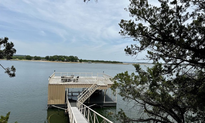 Graford Casa | Large, shady patio with deep-water two-story dock with sunset views. Sleeps 8
