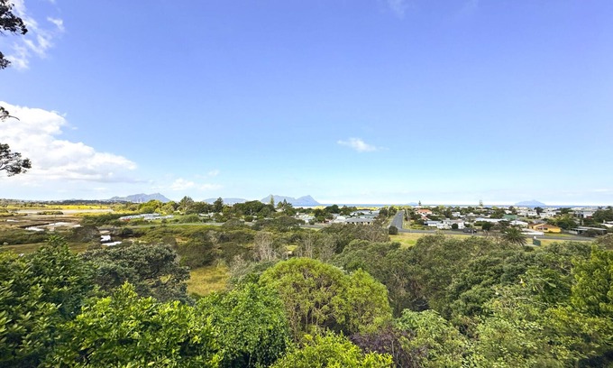 Ruakaka Casa | Large sunny home with stunning panoramic sea views of Bream Bay