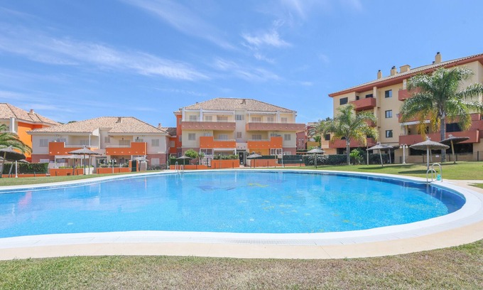Islantilla Casa | LAS CUMBRES - Acogedor apartamento con piscina compartida