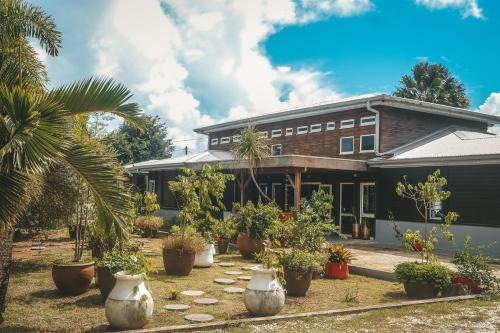 Le Lamentin Casa | Le Baobab Rouge - Maison d'hôtes réservée aux femmes