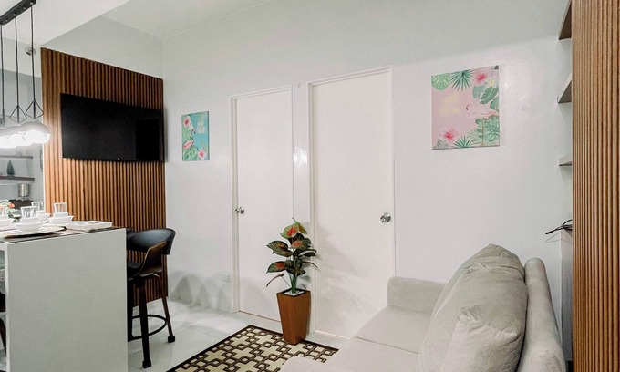 Naga Condominio | Léo's Cachette: Your Modern Cityscape of Comfort and Convenience in Naga City