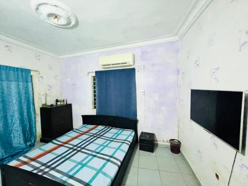 Abomey-Calavi Casa | Les bois sacrés house