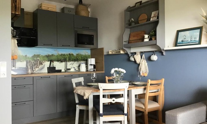 Dornum Apartamento | Liebevoll eingerichtete Ferienwohnung Lüttje Koje