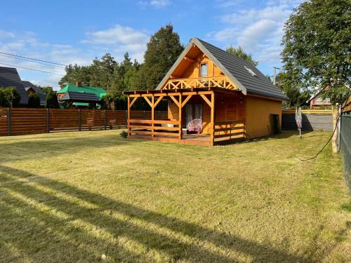 Płaska Casa | Liliowy Domek