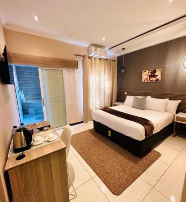 Mahalapye Cama Y Desayuno | LIVE-INN LUXURY SUITES