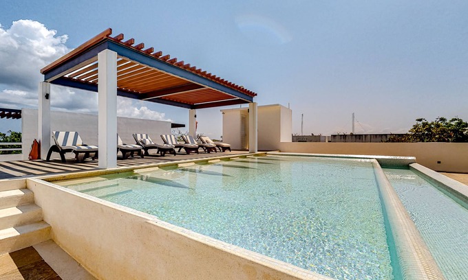 Akumal Apartamento | Lock-off apartment with balcony, rooftop pool, & kitchen - near beach