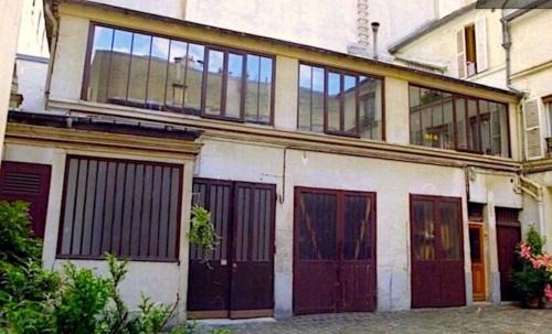 19th Arrondissement Apartamento | Loft character with a view of court