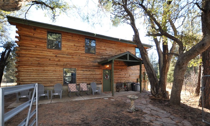 Young Cabina | Log cabin on 2.5 private wooded acres! Bring your horses & ATV's. Hunt area 23