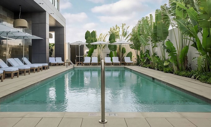 Florida Central Atlantic Coast Hotel | Look No Further! 2 Exquisite Units, w/ Outdoor Pool, Shuttle Service, Parking!