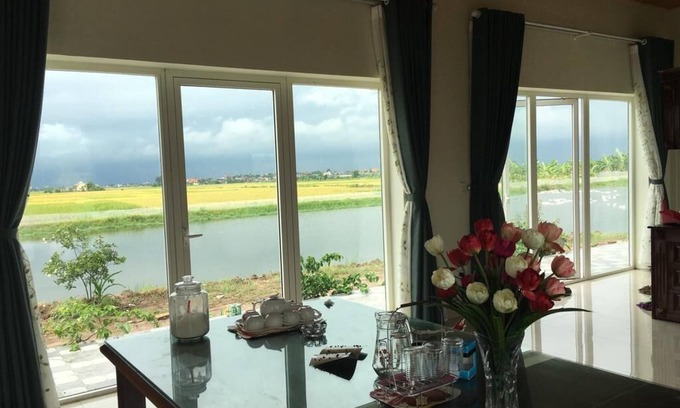 Huyen Kien Thuy Otro | Lotus House con una hermosa vista del campo de arroz