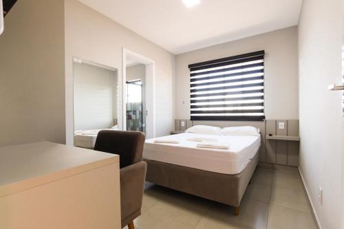 Guarapuava Apartamento | Lou Suítes - Suíte 10 - Cantinho Aconchegante