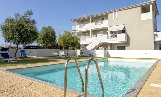 La Muddizza Apartamento | Bonito apartamento para 5 personas con piscina, A/C, WIFI, TV, terraza y aparcamiento