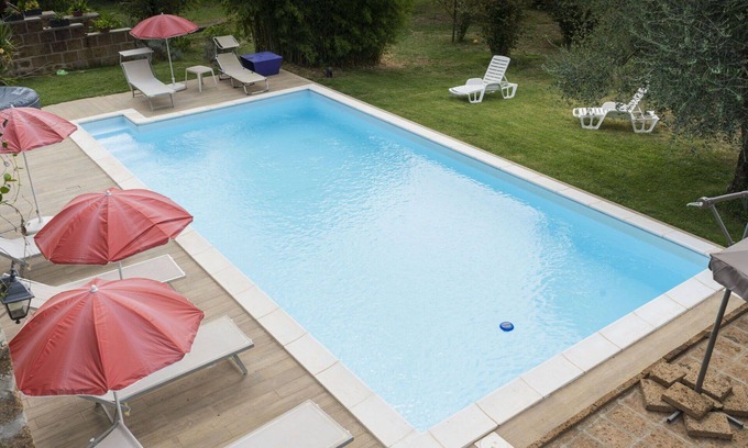 Corchiano Apartamento | Hermoso apartamento para 8 personas con WIFI, piscina, TV, patio, mascotas permitida y aparcamiento