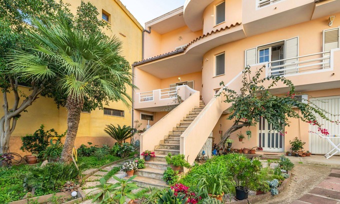Muravera Apartamento | Hermoso apartamento para 6 personas con jacuzzi, A/C, TV, balcón, vista panorámica y aparcamiento