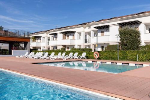 Bibione Lido del Sole Apartamento | Lovely apartment overlooking the pool in Bibione