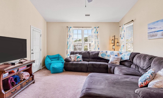 Sunset Beach Condominio | Lovely condo with water view, balcony, full kitchen & W/D - dog-friendly