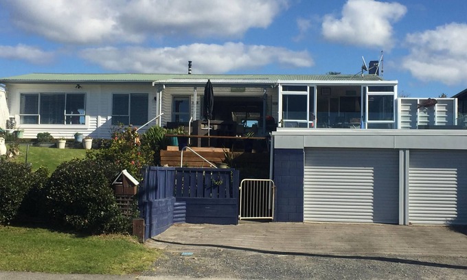 Waihi Beach Casa | Lovely sunny home with beach views to the front and county views at the back.
